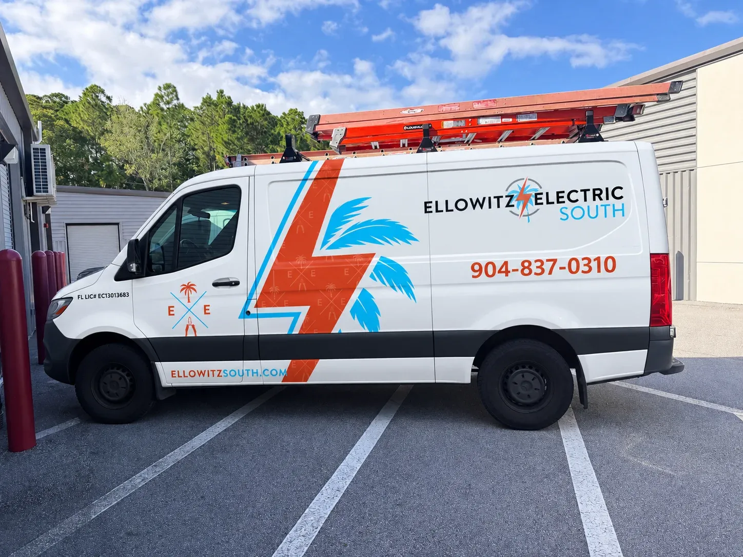 White Ellowitz Electric South Sprinter van with the palm and bolt wrap and the 904-837-0310 number